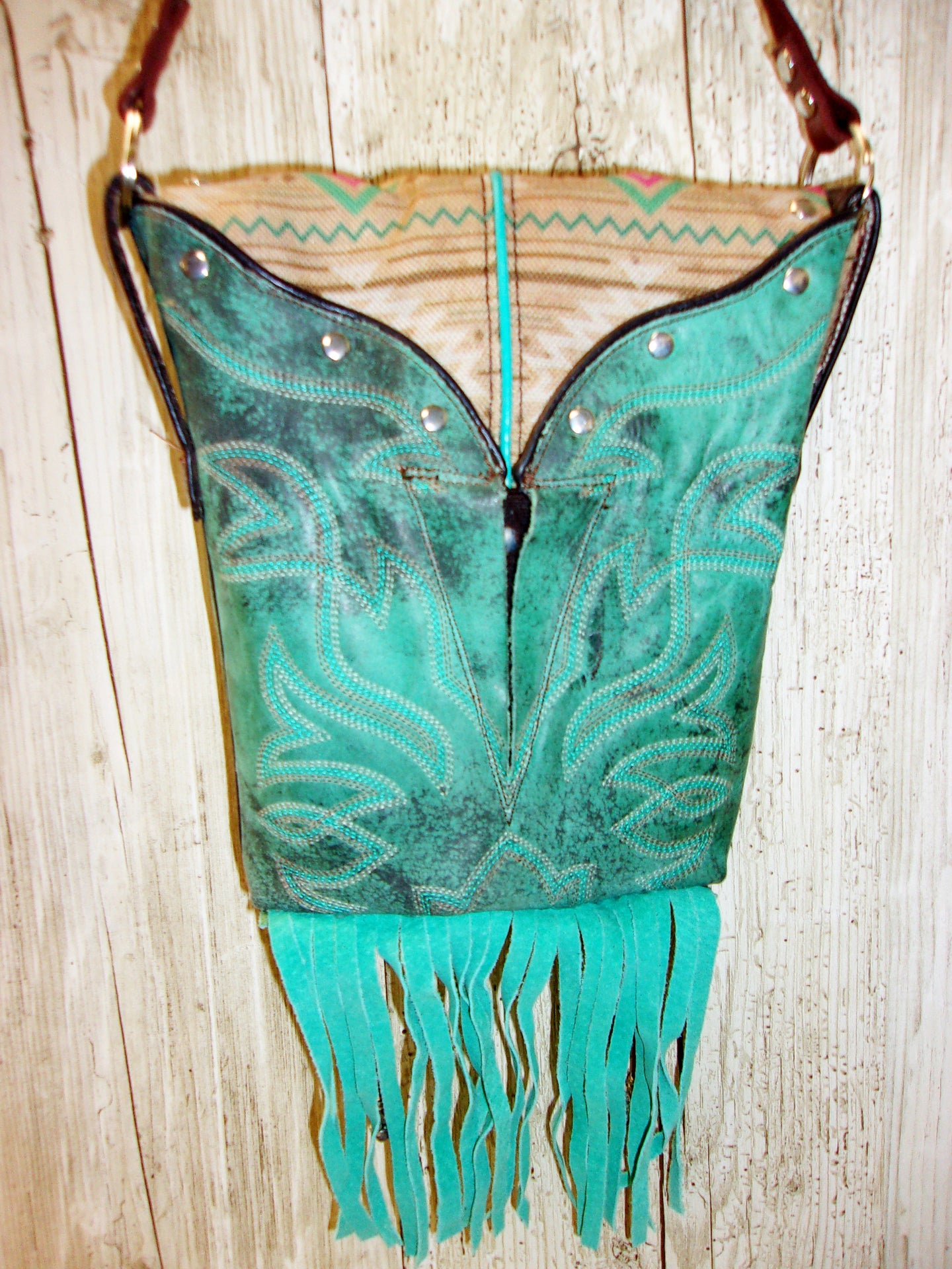 Small Cowboy Boot Purse with Fringe sm213 handcrafted from cowboy boots. Shop all unique leather western handbags, purses and totes at Chris Thompson Bags